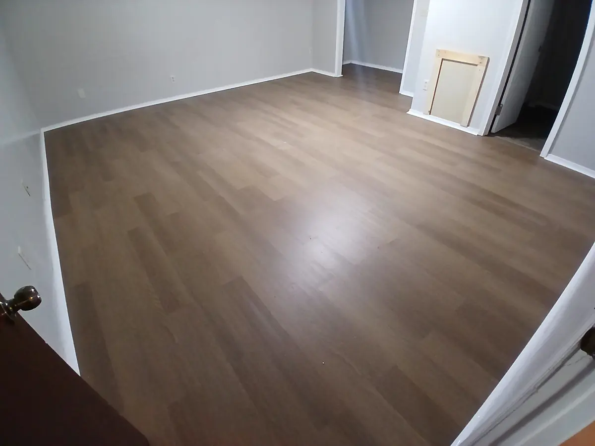 Patched floor to new plank — after